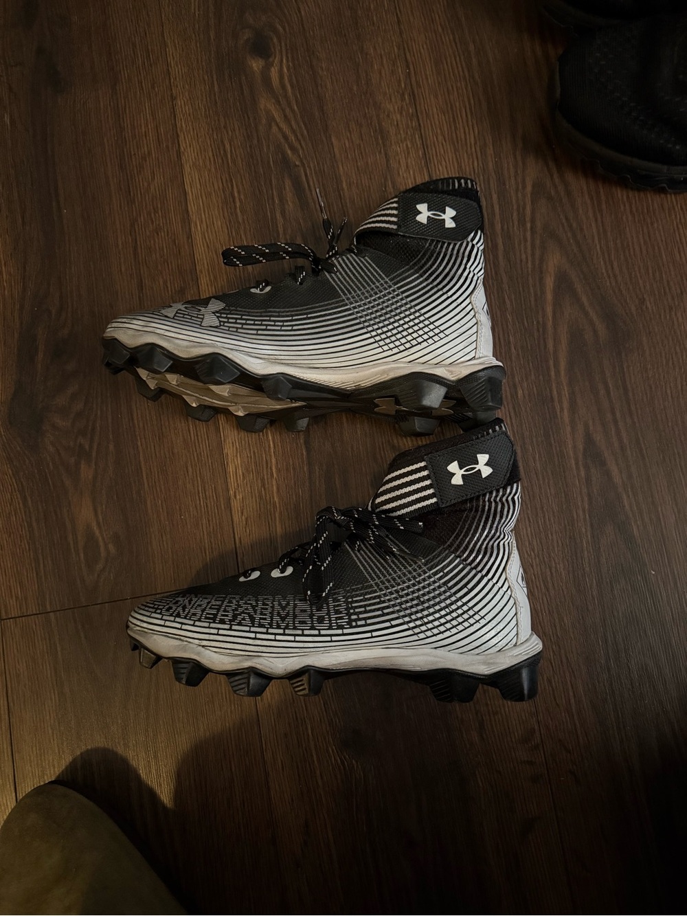 Under Armour Men’s Black and White High-Top Football Cleats